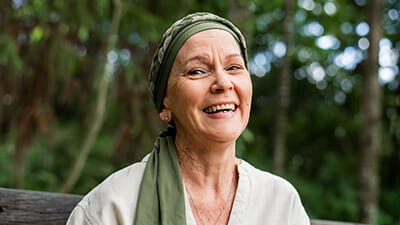Portrait of a smiling woman wearing a head scarf