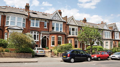 A row of desirable terraced houses on a sunny day