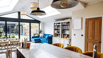 British modern home interior with open space kitchen