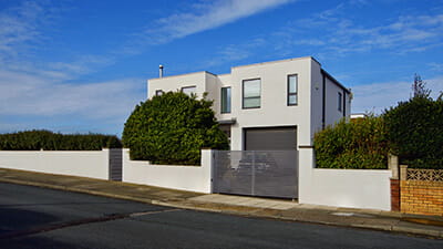 A house with a flat roof on a sunny day