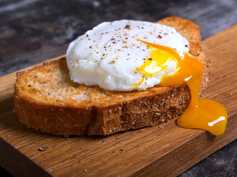 Poached egg on toast | Getty/Tatiana_Didenko