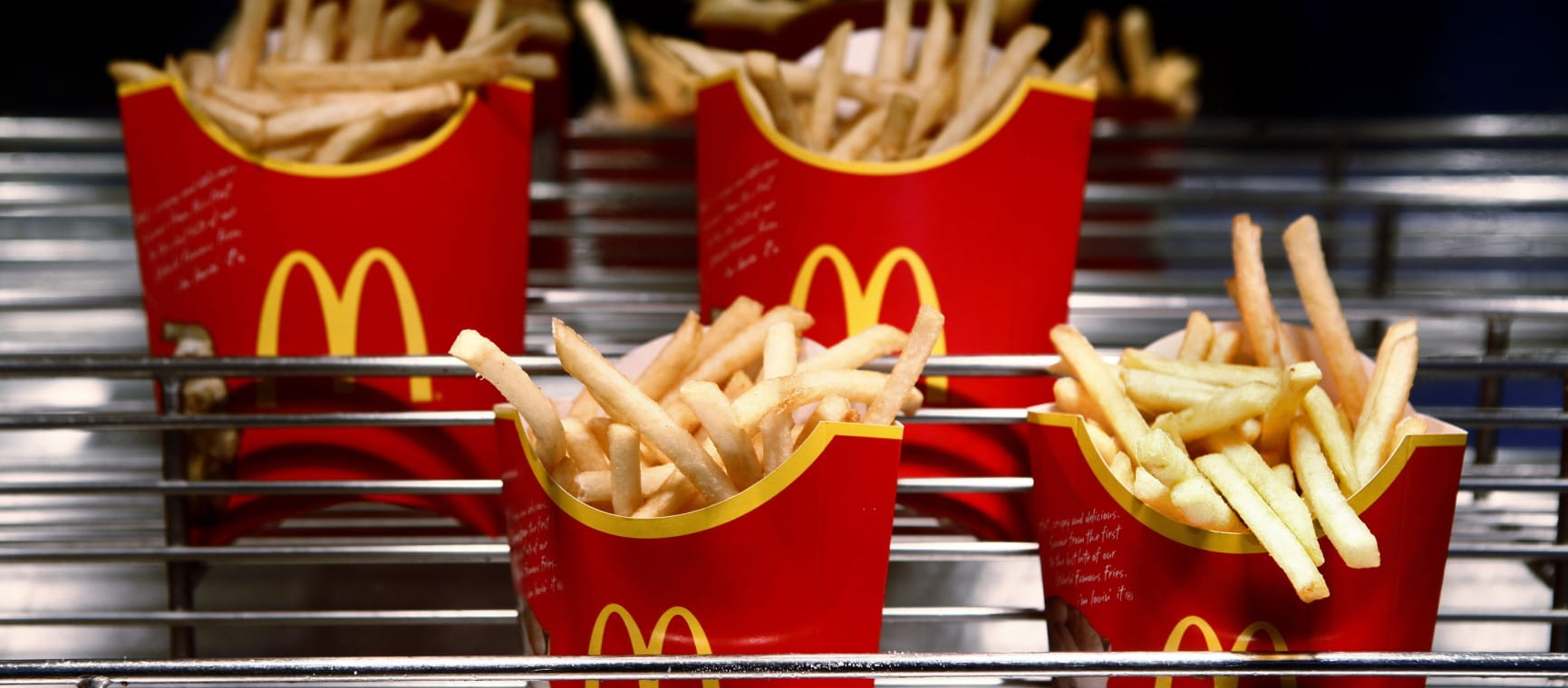 Four cartons of fries from McDonald's | Getty