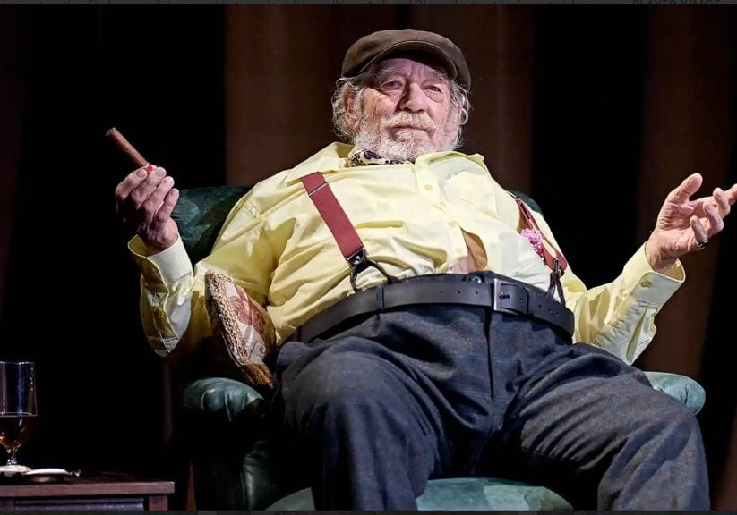 Sir Ian McKellen in a fat suit on stage playing Falstaff