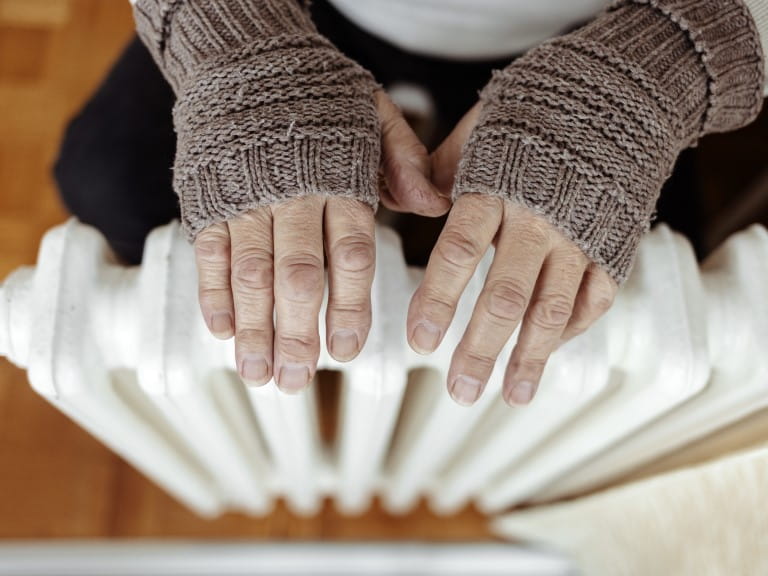 Warming cold hands without the Winter Fuel Allowance | Getty/Jelena Stanojkovic