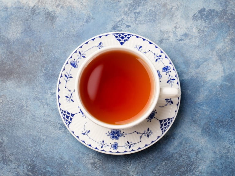 A cup of tea on a blue table