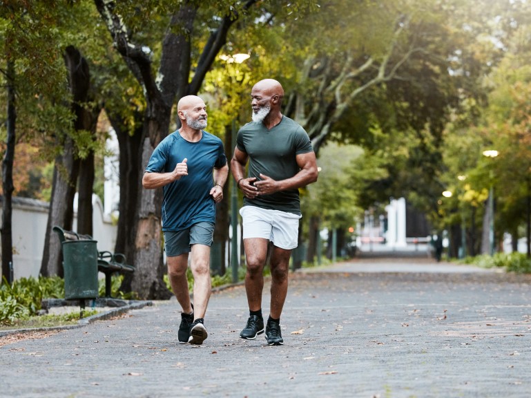 Two older men road running