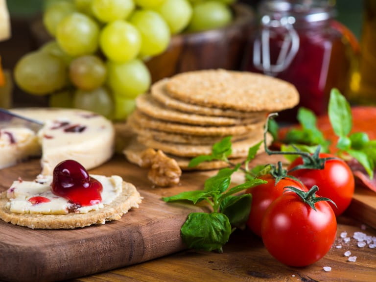 traditional english soft cheese with cranberry sauce | Getty/merc67