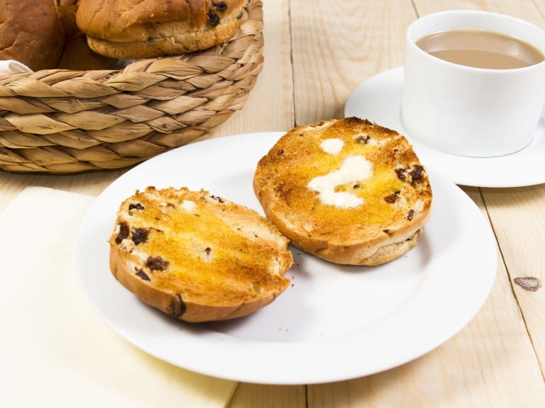 A freshly made traditional British tea cakes with a cup of tea | Getty/Andrew1Norton