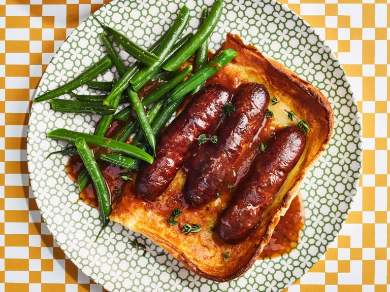 Air fryer toad in the hole served with green beans