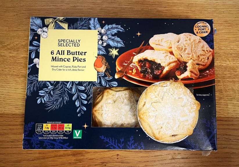 a box of Aldi mince pies on a wooden table top
