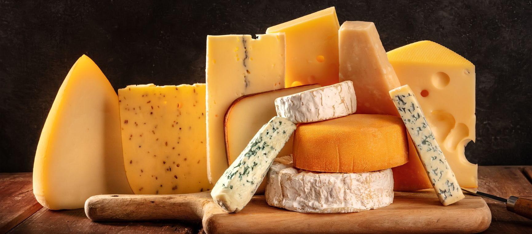 A selection of cheeses on a board