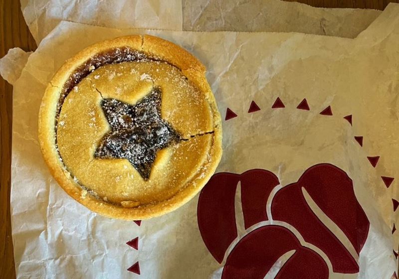 A Costa mince pie on a costa paper bag