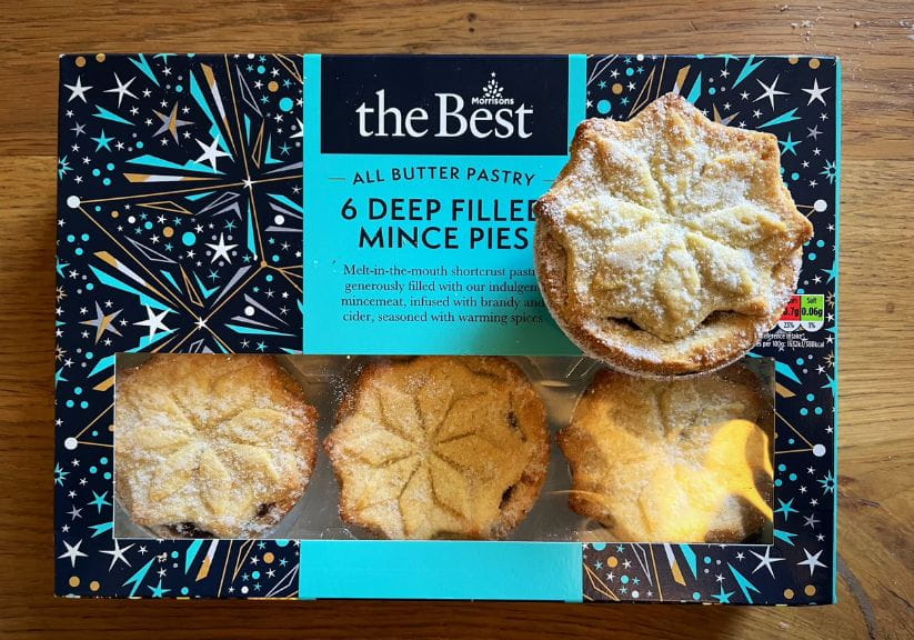 A box of Morrisons The Best mince pies on a wooden table top