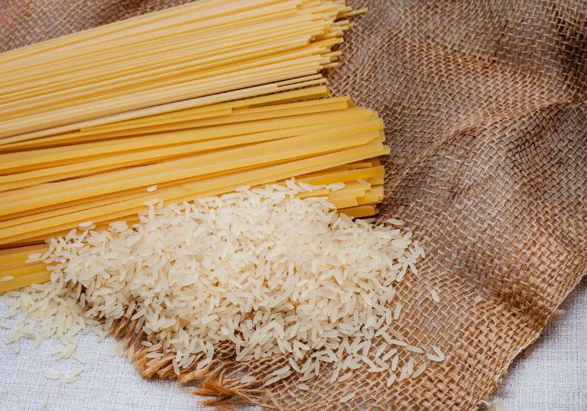 long spaghetti, tagliatelle and rice on top of a hessian sheet