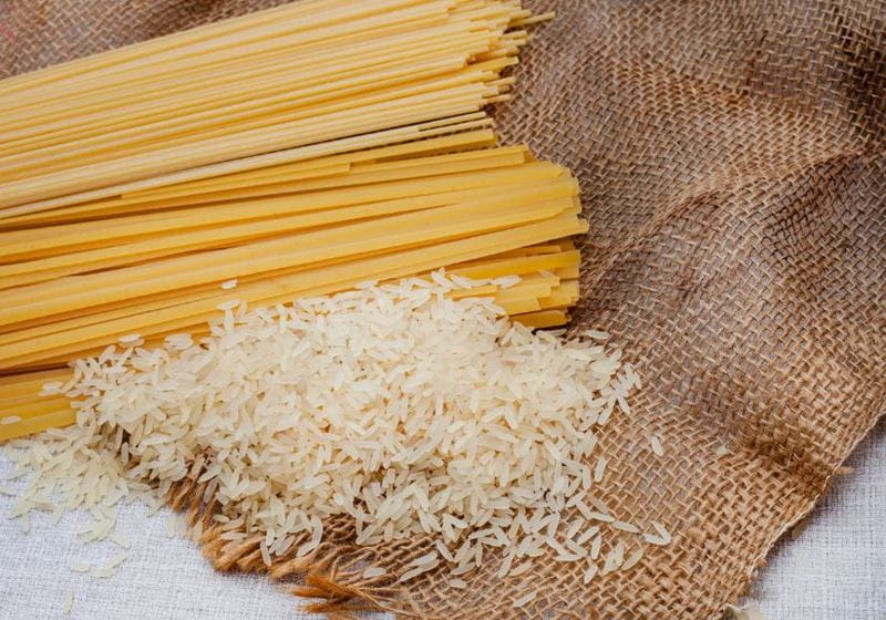 long spaghetti, tagliatelle and rice on top of a hessian sheet