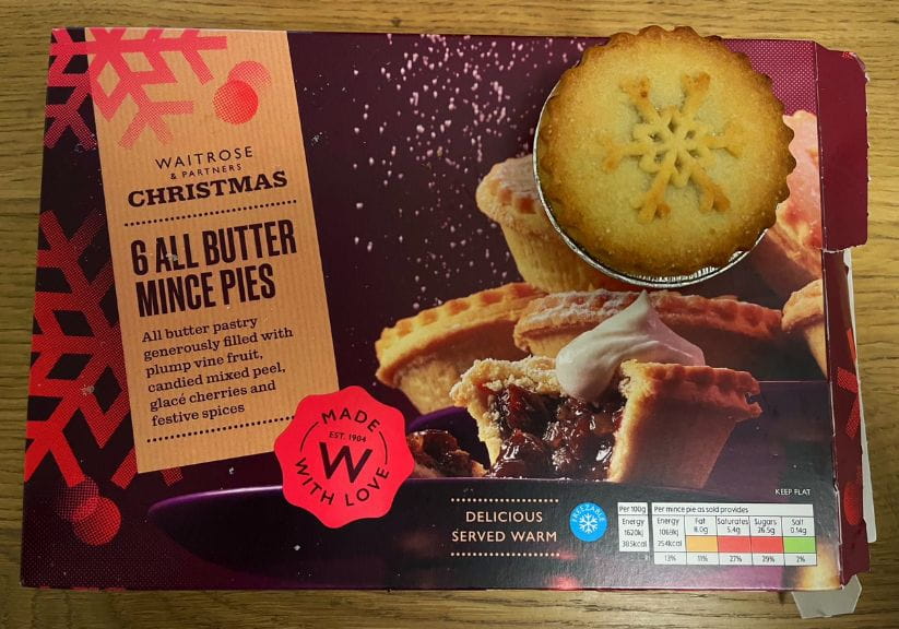 a box of Waitrose all butter mince pies on a wooden table top