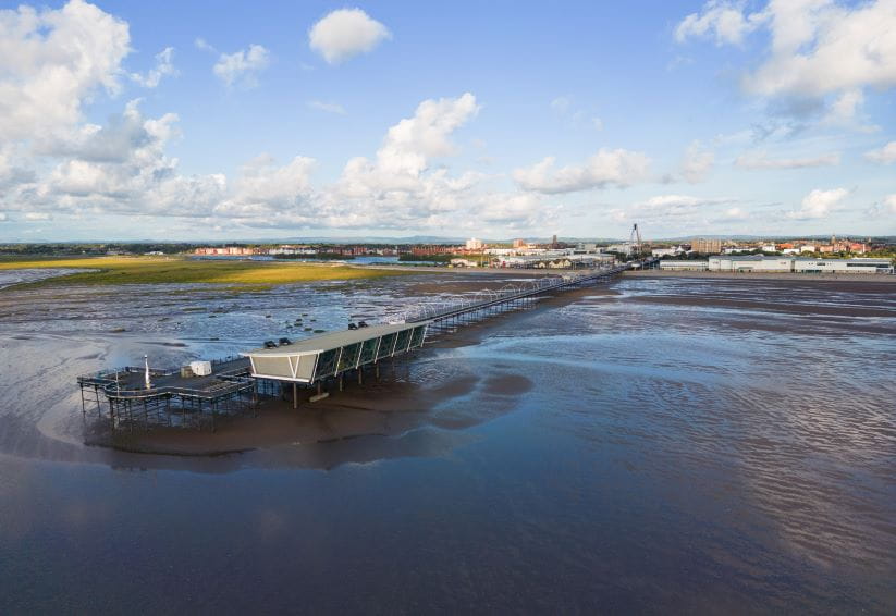 Aerial view of Southport Pier on a sunny afternoon