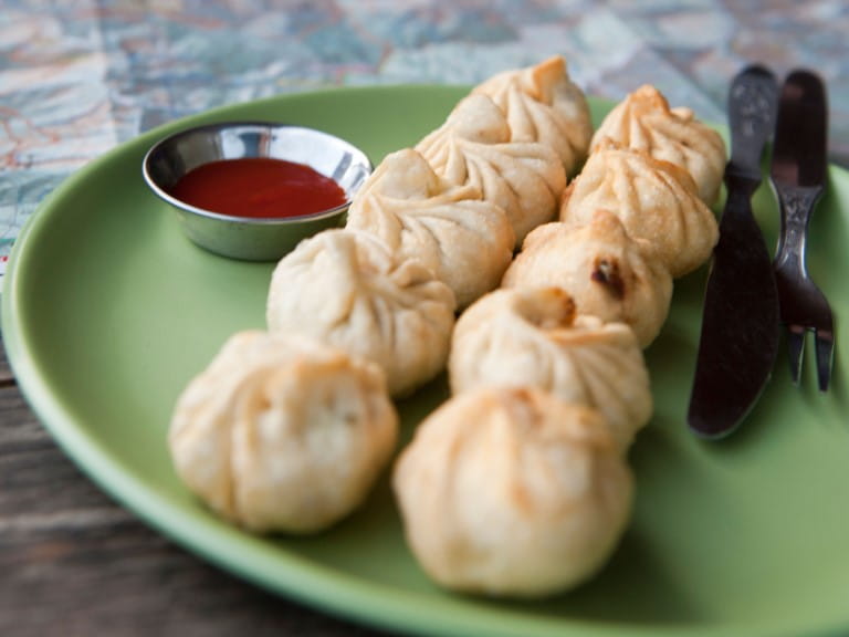Delicious momos, a local Bhutan dish | Alamy