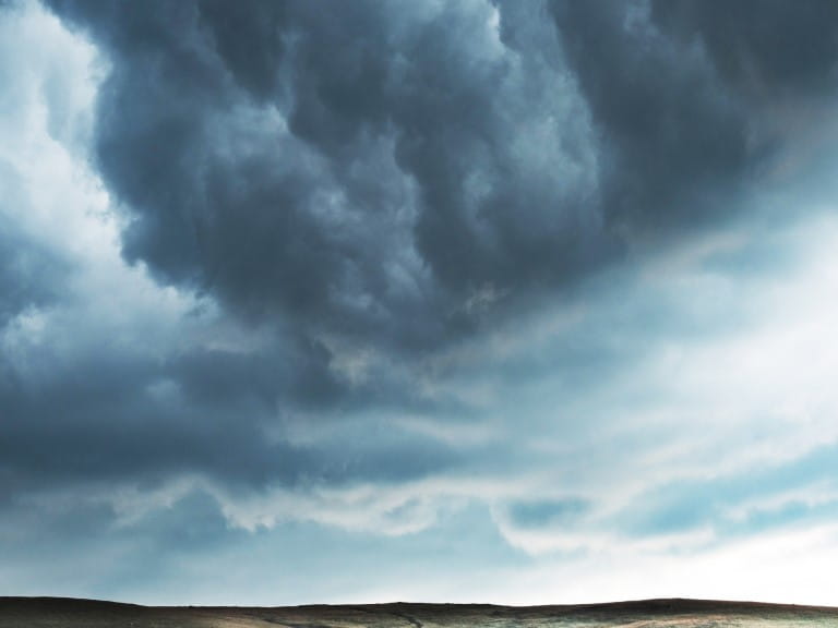 Dark clouds looking very ominous in the sky | Getty/BogdanV