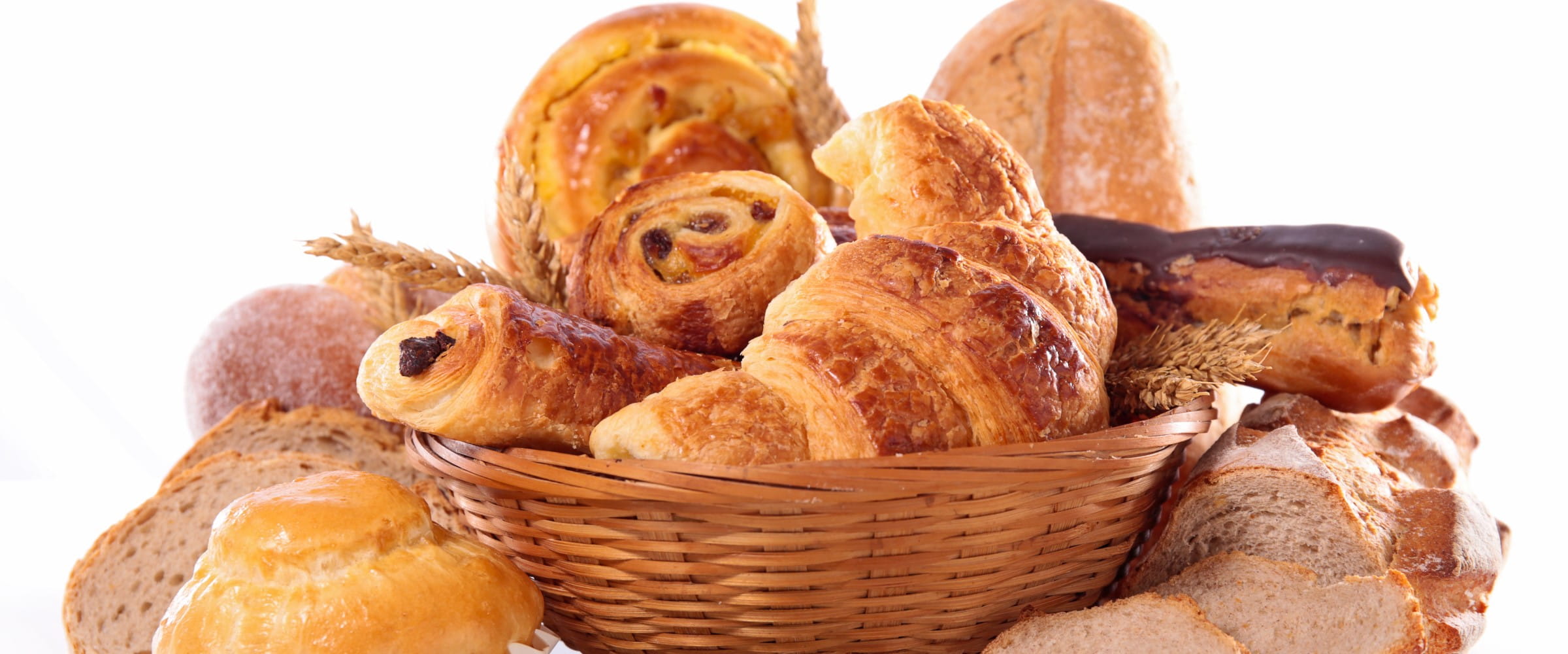Assorted croissants, pastries and bread | Getty/margouillatphotos