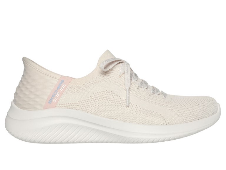 A white slip on trainer shoe by Skechers
