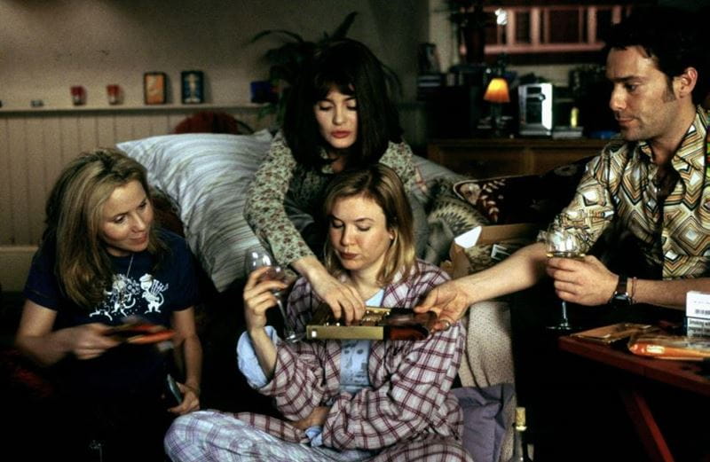 Bridget Jones with her 3 best friends in the lounge in the film