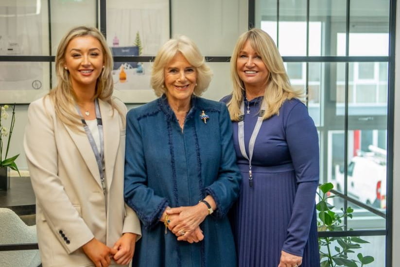 Deborah and her daughter Ella Cox with Queen Camilla