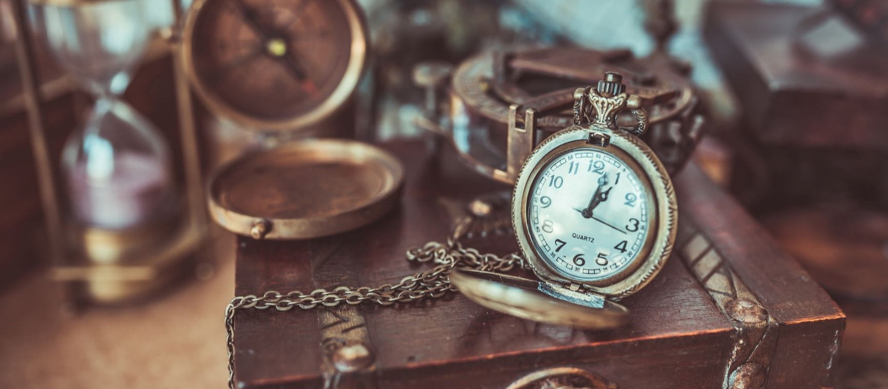 treasures in a loft including a pocket clock