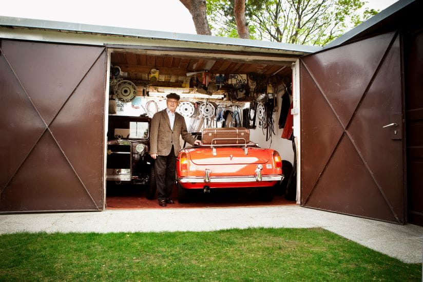 Man with a car in his garage
