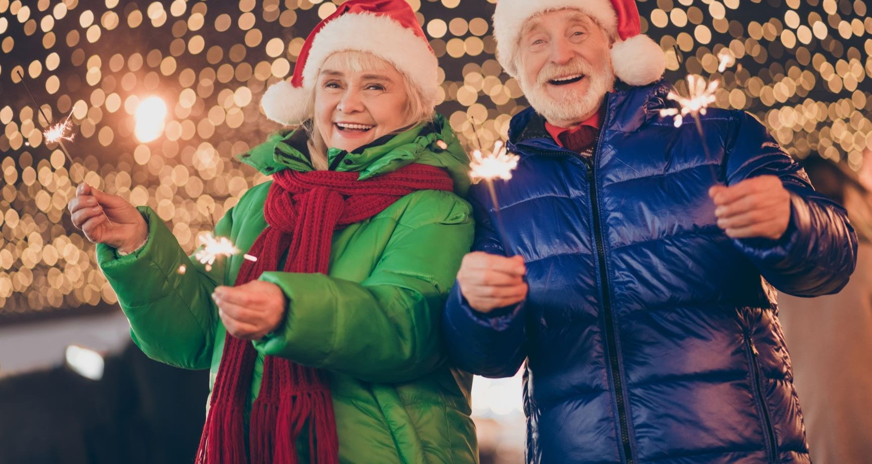 couple with sparklers at Christmas
