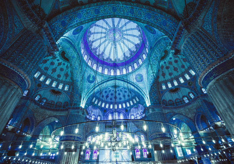 The ornate and blue coloured interior of the blue mosque