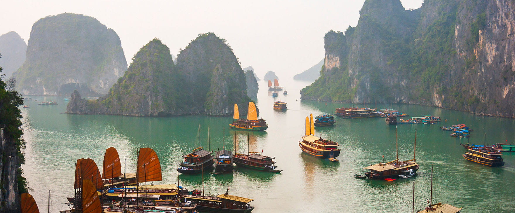 Halong Bay’s karst islands' junk boats