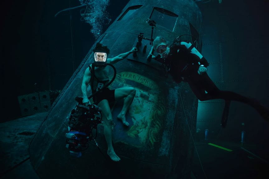 Tom Cruise in Mission Impossible next to a submarine