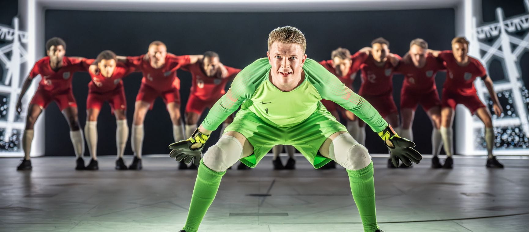 Goalie at the front of the squad on stage