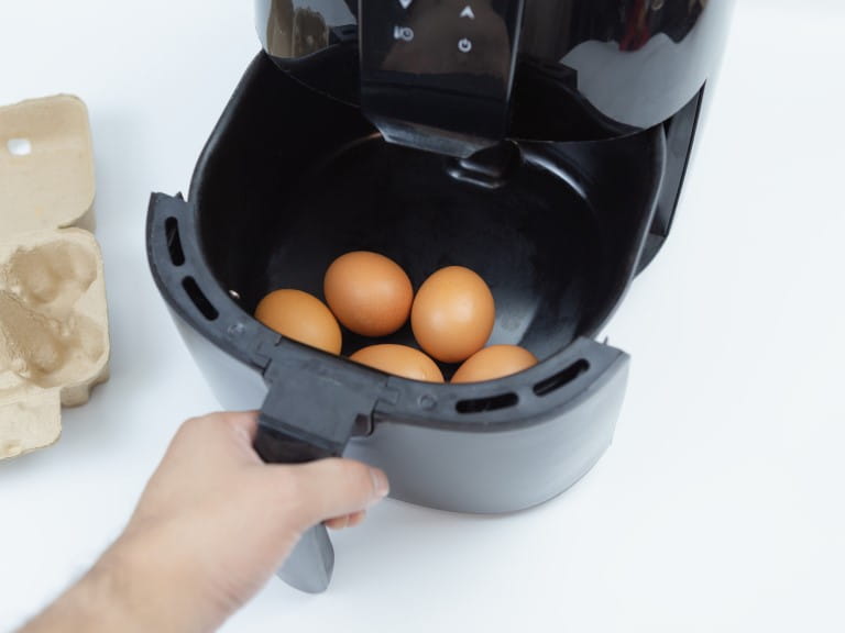 Eggs placed in an air fryer
