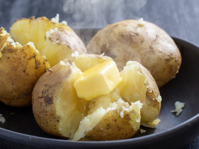 Butter on jacket potatoes