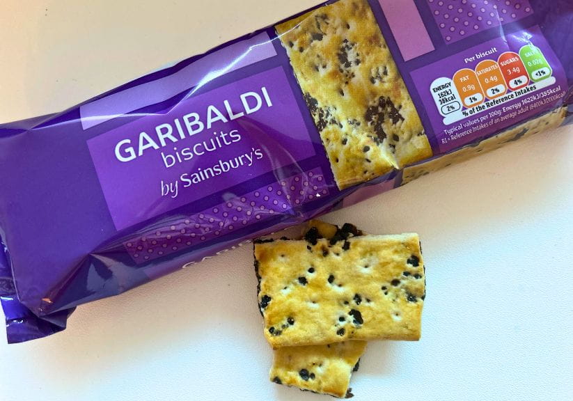 A packet of Sainbury's Garilbaldi biscuits shot against a white background