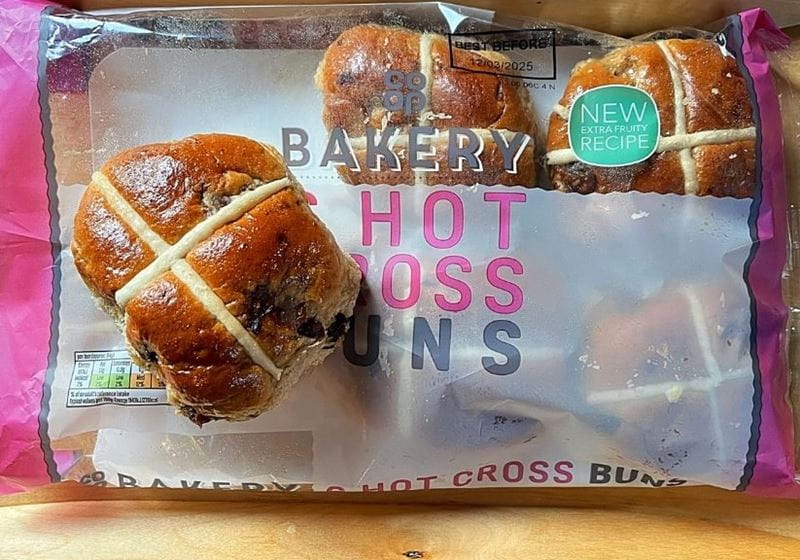 A packet of Coop bakery hot cross buns