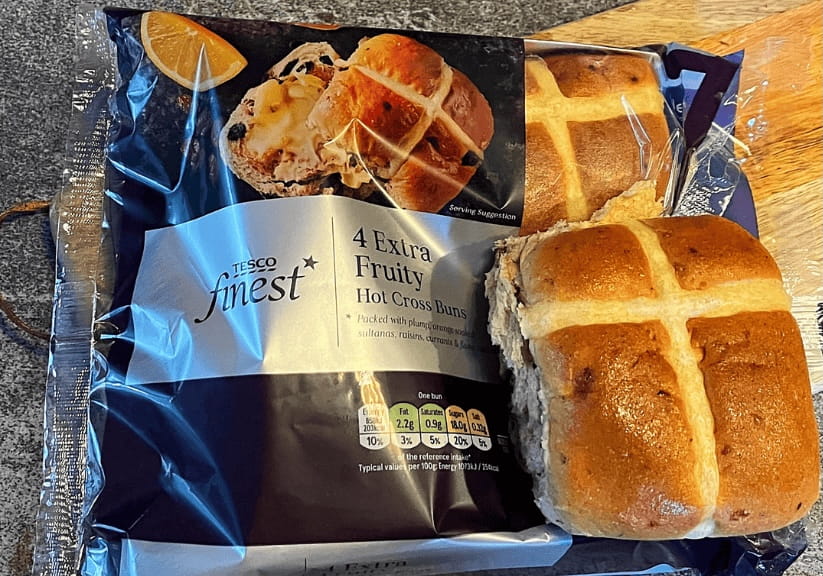 A packet of Tesco finest hot cross buns