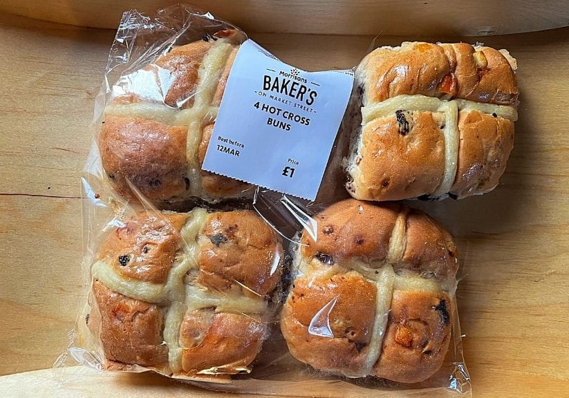 a packet of Morrisons bakers hot cross buns