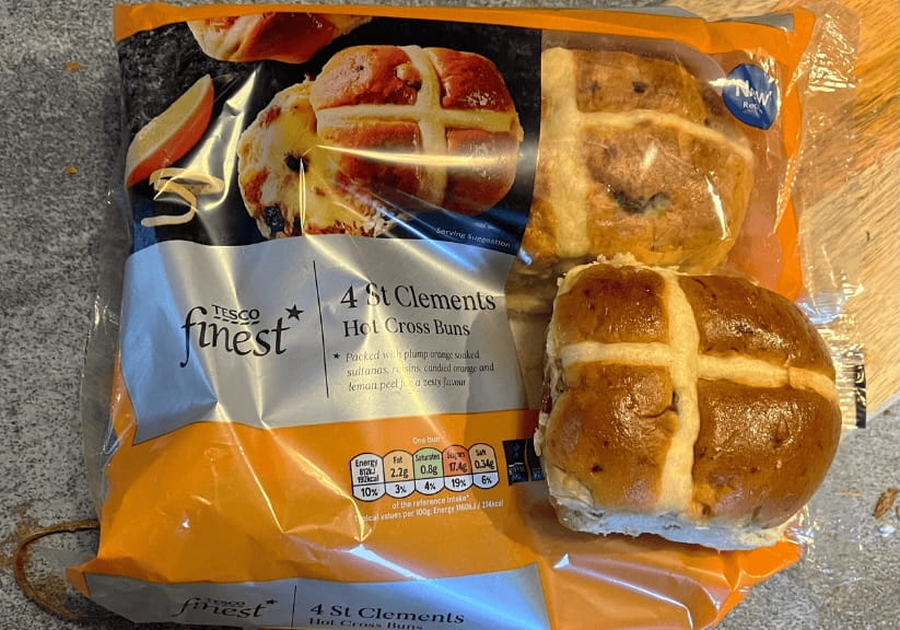 A packet of Tesco St Clements hot cross buns