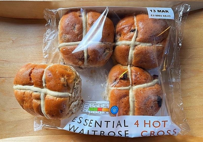 A packet of Waitrose Essential Hot Cross Buns