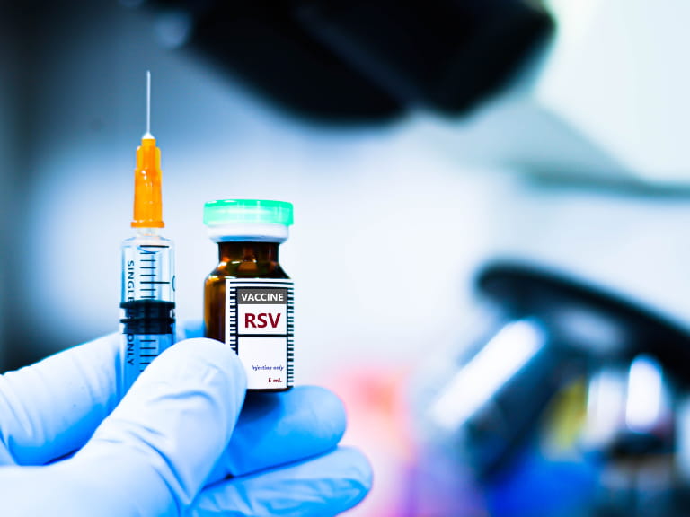 An RSV vaccine bottle and needle