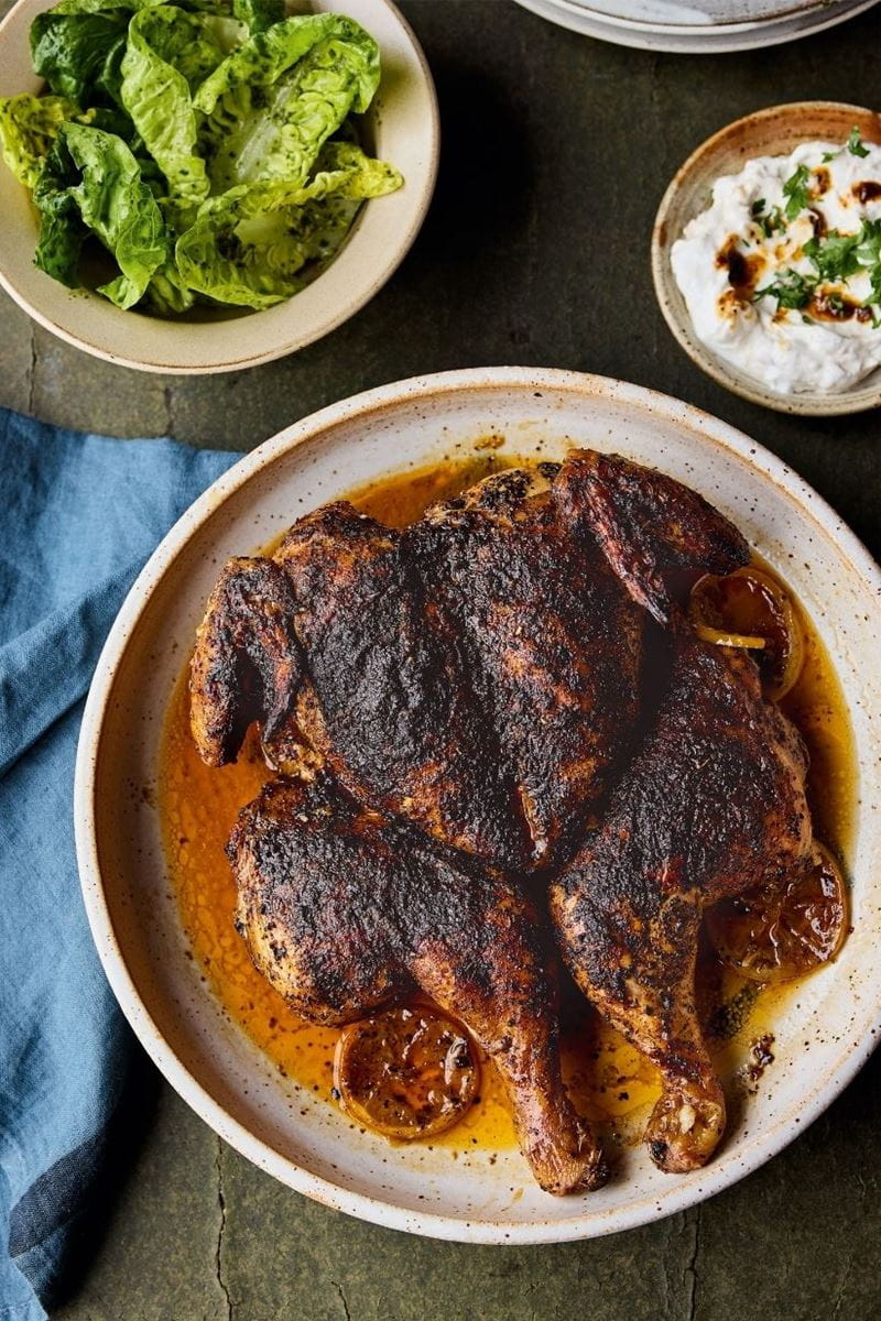 a cooked loomi chicken on a table