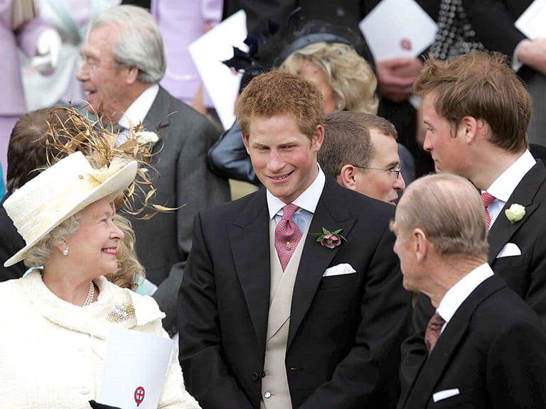 prince harry with queen elizabeth and prince phillip