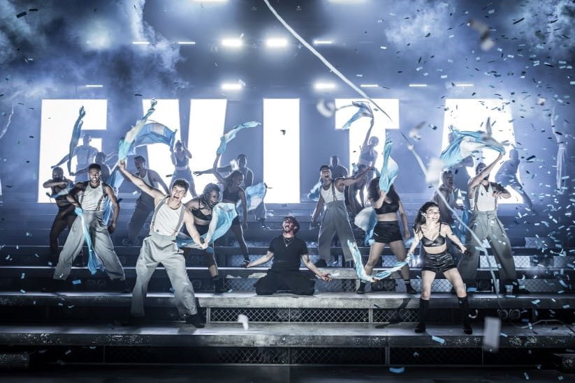 cast of Evita on stage