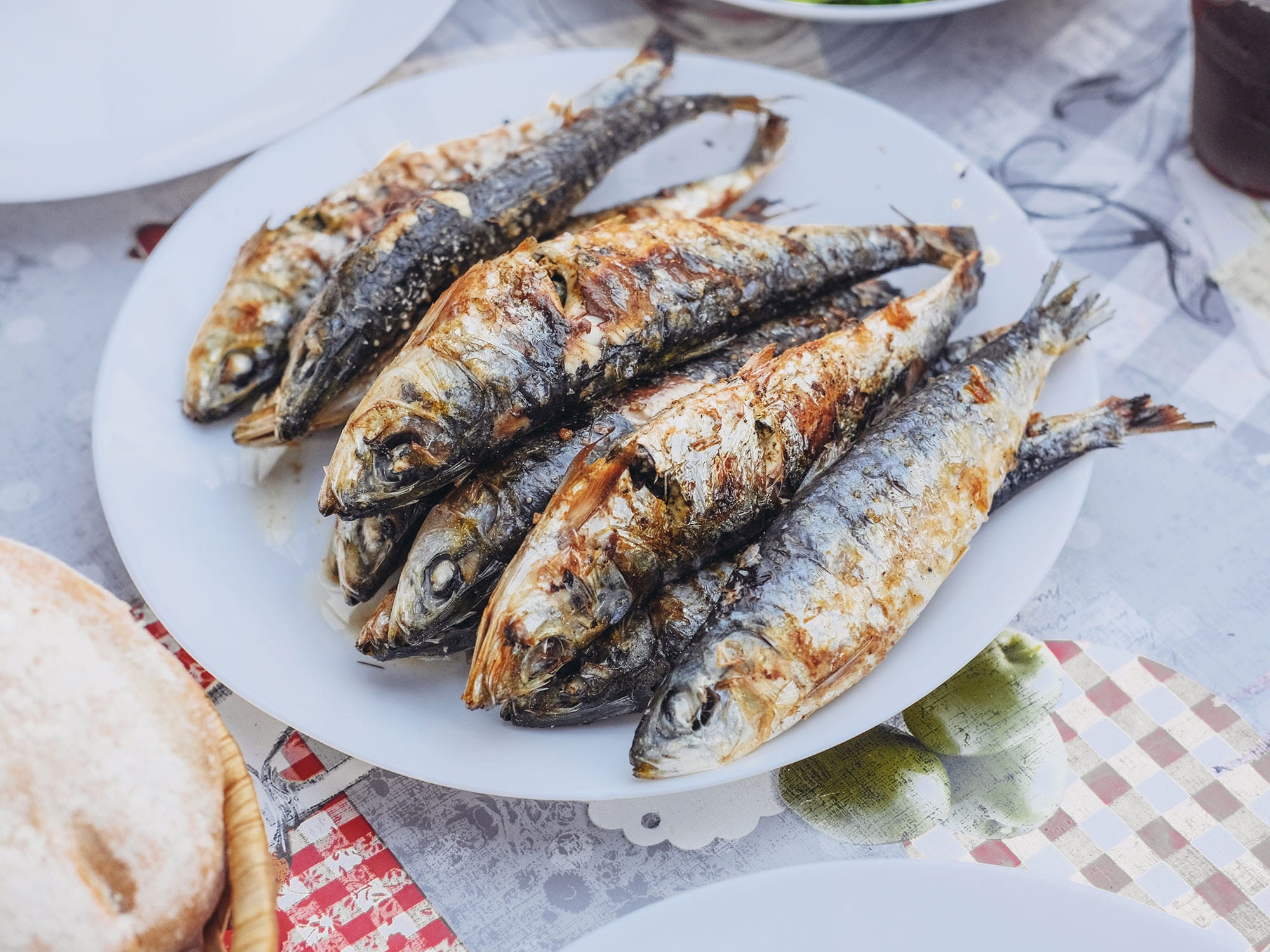 A plate of grilled sardines