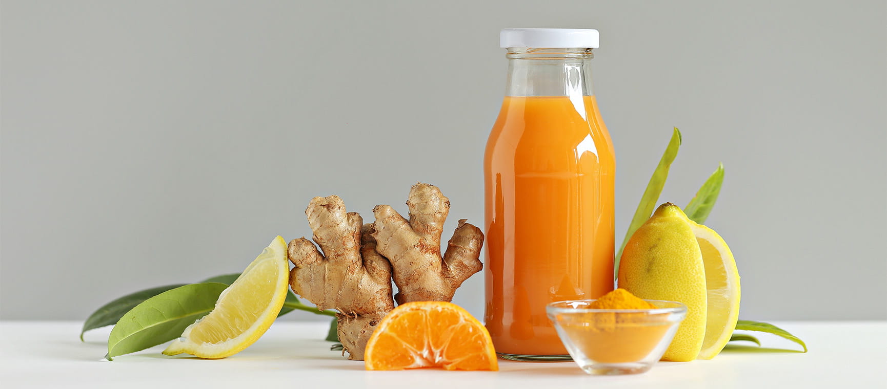 Ginger juice with oranges and lemons