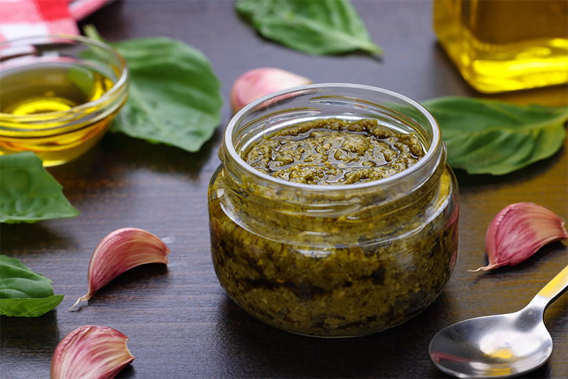A jar of green pesto