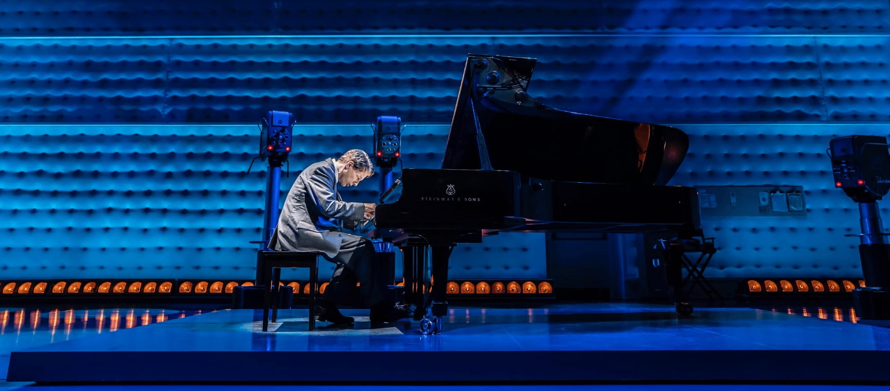 a man playing a piano in Good Night, Oscar show